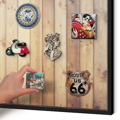 Metal wall board for magnets in a black frame Wooden boards