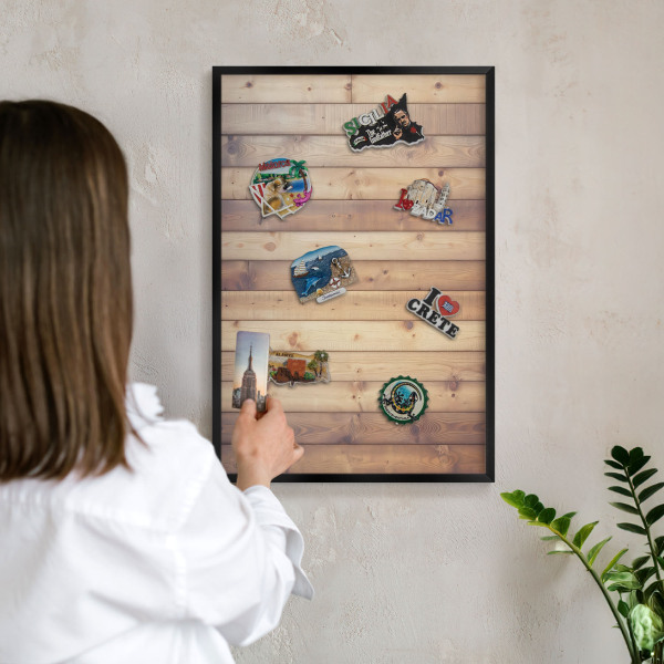 Metal wall board for magnets in a black frame Wooden boards