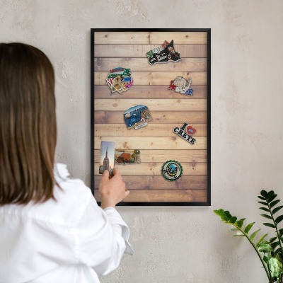 Metal wall board for magnets in a black frame Wooden boards