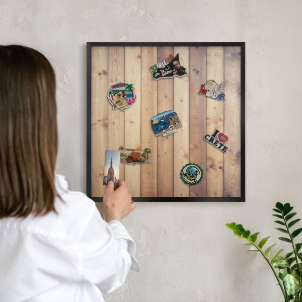 Metal wall board for magnets in a black frame Wooden boards