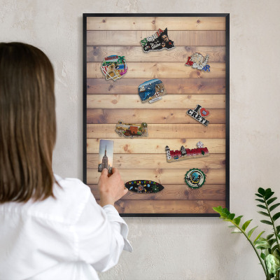 Metal wall board for magnets in a black frame Wooden boards