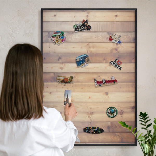 Metal wall board for magnets in a black frame Wooden boards