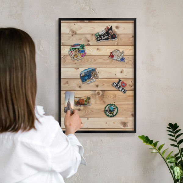 Vacation magnet board with a black frame Wooden boards