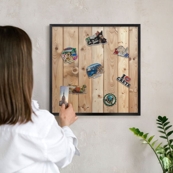 Vacation magnet board with a black frame Wooden boards