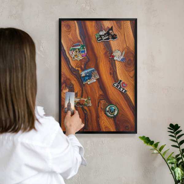 Metal wall board for magnets in a black frame Wooden rings