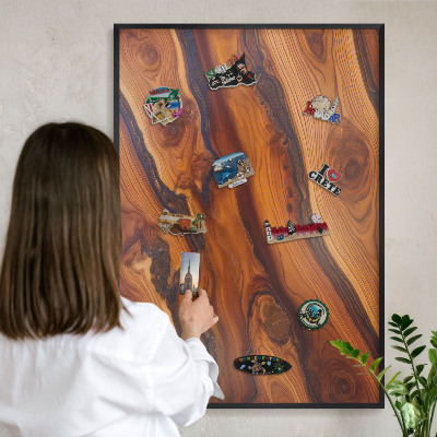 Metal wall board for magnets in a black frame Wooden rings