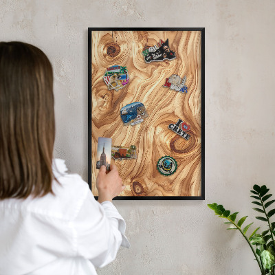 Vacation magnet board with a black frame Wooden texture