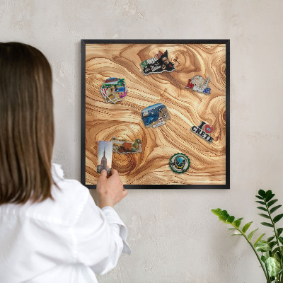 Vacation magnet board with a black frame Wooden texture