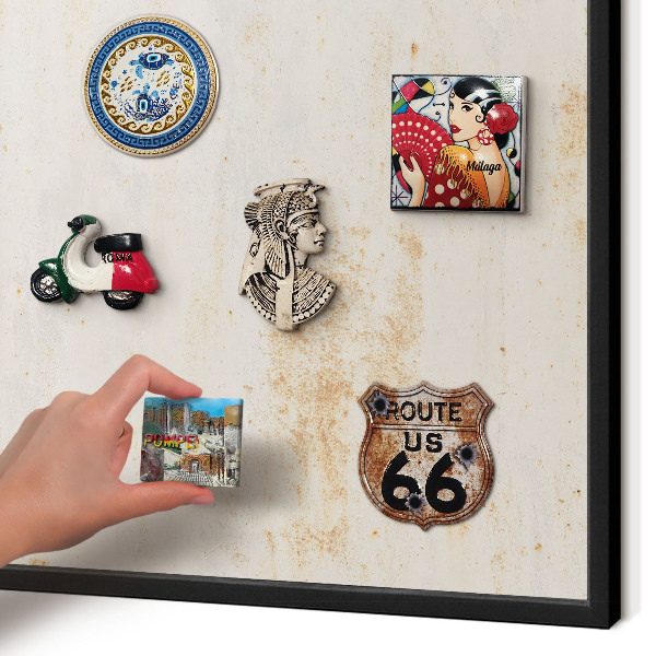 Metal wall board for magnets in a black frame Rusty texture