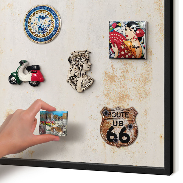 Metal wall board for magnets in a black frame Rusty texture