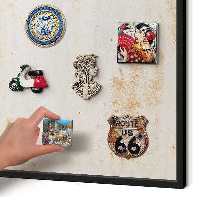 Metal wall board for magnets in a black frame Rusty texture