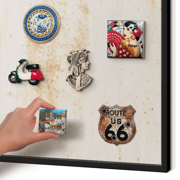 Metal wall board for magnets in a black frame Rusty texture