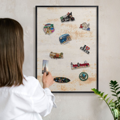 Metal wall board for magnets in a black frame Rusty texture