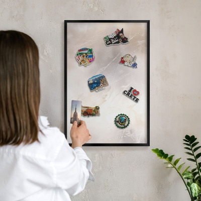 Metal wall board for magnets in a black frame Soft lightness