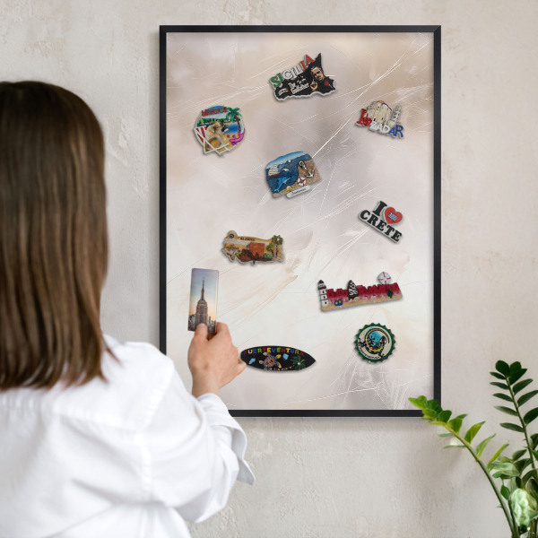 Metal wall board for magnets in a black frame Soft lightness