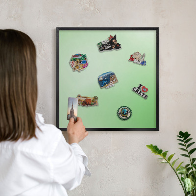 Metal wall board for magnets in a black frame Green harmony