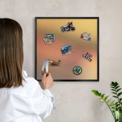 Metal wall board for magnets in a black frame Colorful glow