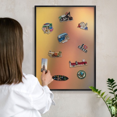 Metal wall board for magnets in a black frame Colorful glow