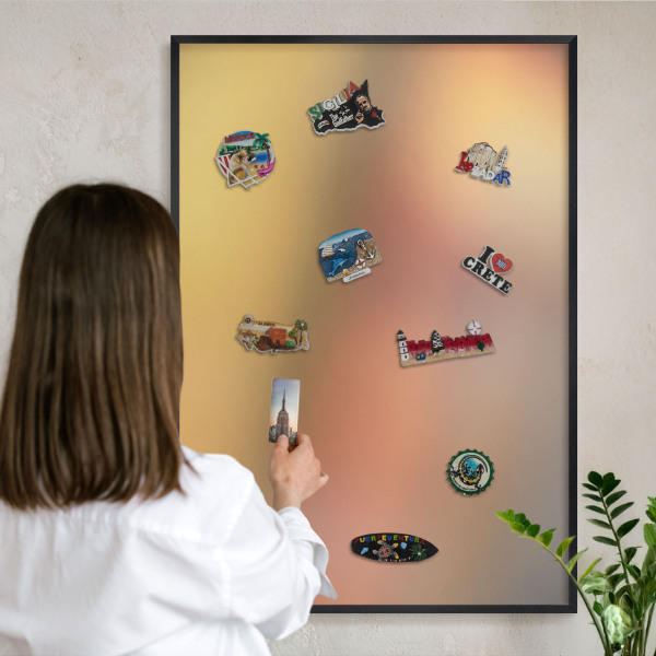 Metal wall board for magnets in a black frame Colorful glow