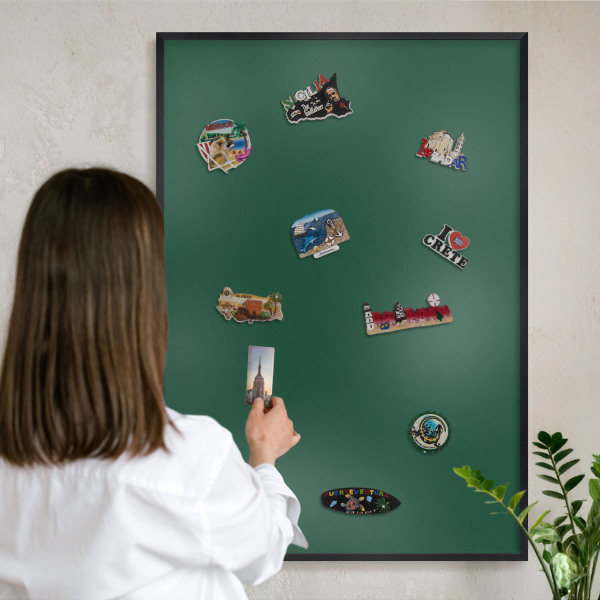 Metal wall board for magnets in a black frame Bottle green