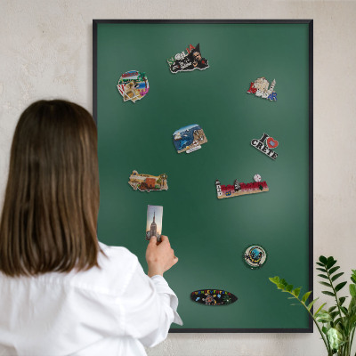 Metal wall board for magnets in a black frame Bottle green