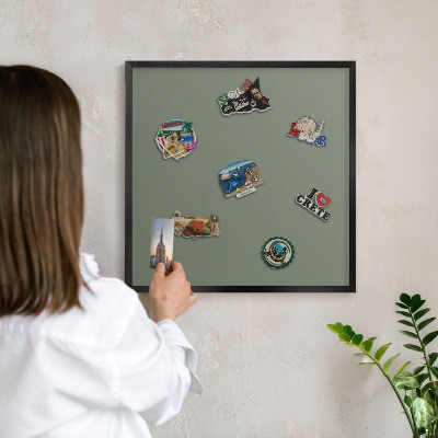 Vacation magnet board with a black frame Dark sage