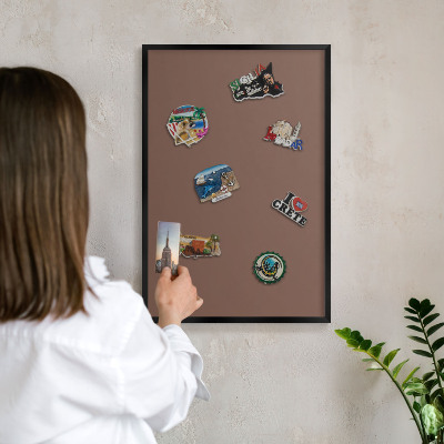 Metal wall board for magnets in a black frame Brown color