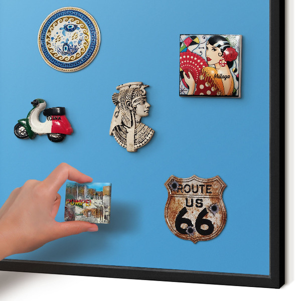 Vacation magnet board with a black frame Blue water