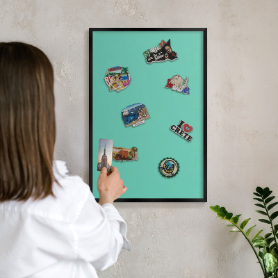 Metal wall board for magnets in a black frame Strong mint
