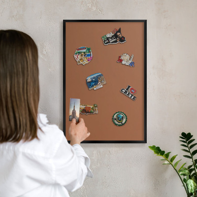 Metal wall board for magnets in a black frame Dark orange