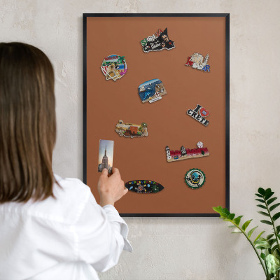Metal wall board for magnets in a black frame Dark orange