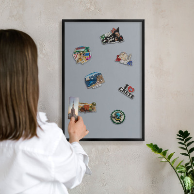 Vacation magnet board with a black frame Delicate gray