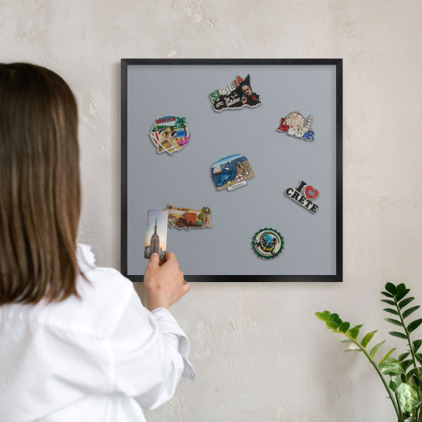 Vacation magnet board with a black frame Delicate gray