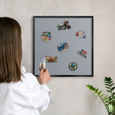 Vacation magnet board with a black frame Delicate gray