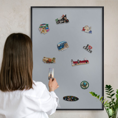 Vacation magnet board with a black frame Delicate gray
