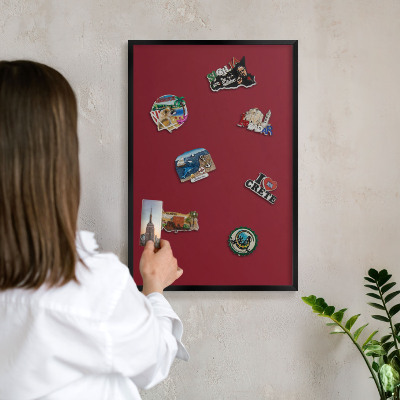 Metal wall board for magnets in a black frame Vivid burgundy