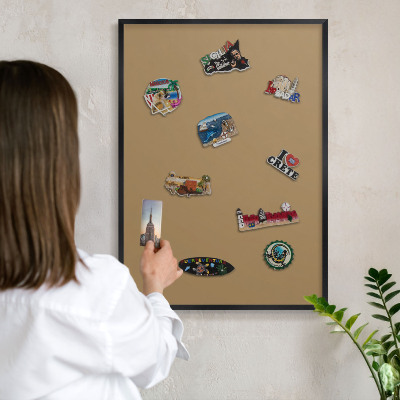 Metal wall board for magnets in a black frame Brown color