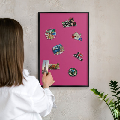 Metal wall board for magnets in a black frame Intense pink