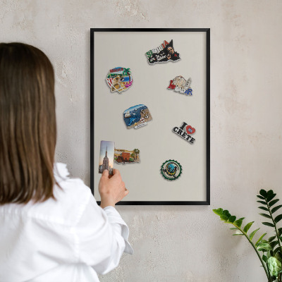 Metal wall board for magnets in a black frame Warm stone