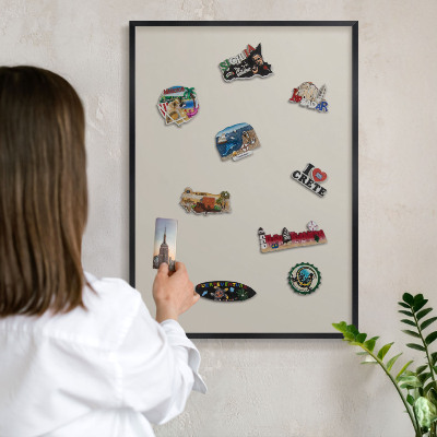 Metal wall board for magnets in a black frame Warm stone