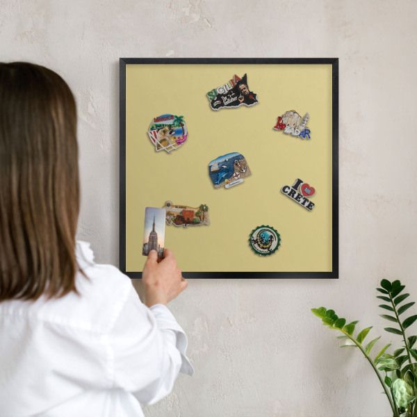 Metal wall board for magnets in a black frame Vintage yellow
