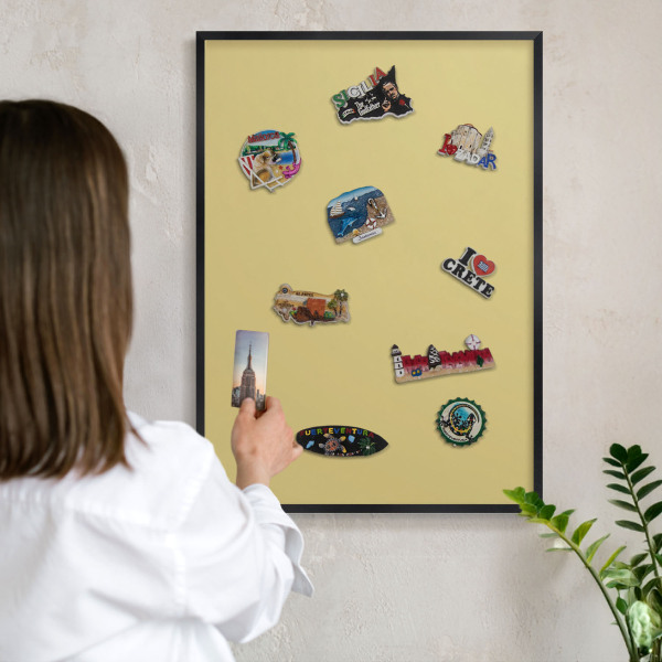 Metal wall board for magnets in a black frame Vintage yellow