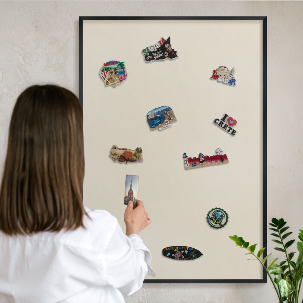 Metal wall board for magnets in a black frame Light stone