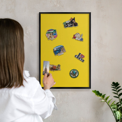 Vacation magnet board with a black frame Intense yellow