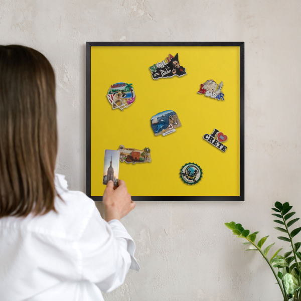 Vacation magnet board with a black frame Intense yellow