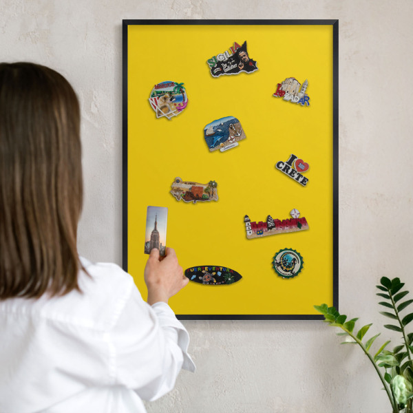 Vacation magnet board with a black frame Intense yellow