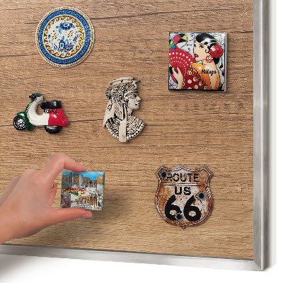 Souvenir magnet display board with a silver frame Wood texture