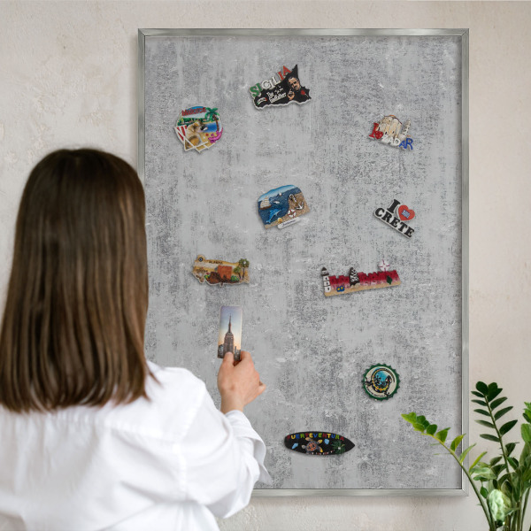 Souvenir magnet display board with a silver frame Gray surface