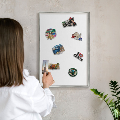 Souvenir magnet display board with a silver frame Pure white