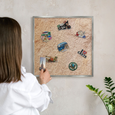 Souvenir magnet display board with a silver frame Stone texture